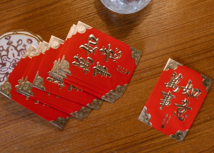 Tradisi Pemberian Angpao Saat Perayaan Imlek: Makna, Etika, dan Aturan yang Perlu Diketahui