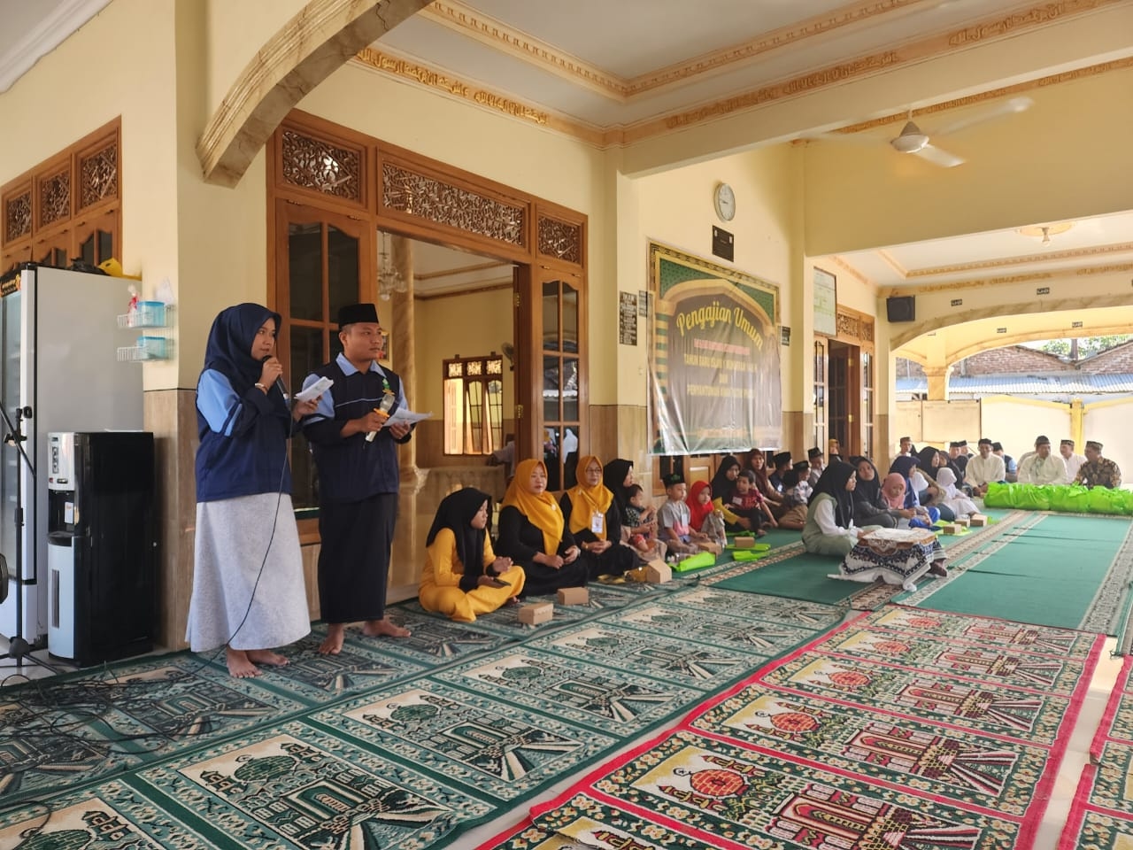 KKN MIT 16 Posko 92 UIN Walisongo Semarang Berpartisipasi Dalam Pengajian dan Santunan di Desa Bumiayu
